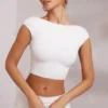 Partes de arriba cortas con mangas casquillo y espalda abierta Juno en blanco