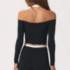 Partes de arriba de jersey suave con hombros descubiertos en negro