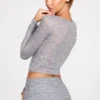 Partes de arriba de manga larga con escote pronunciado de jersey transparente Liah en gris