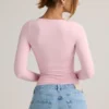 Partes de arriba de manga larga con fruncidos Emry Modal en rosa bebé