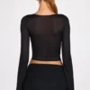 Partes de arriba largas de manga larga con escote pronunciado de jersey transparente Liah en negro