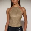 Partes de arriba sin espalda con cuello halter de jersey adornado Tindra en dorado