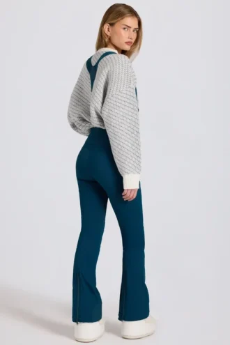 Peto impermeable de talle alto con tirantes en color verde azulado