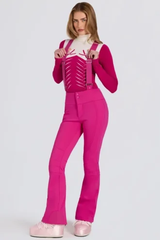Peto impermeable de talle alto con tirantes en rosa magenta