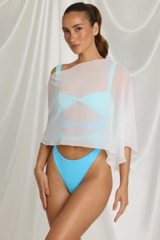 Poncho transparente Zarayah en blanco