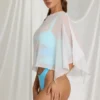 Poncho transparente Zarayah en blanco