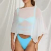 Poncho transparente Zarayah en blanco