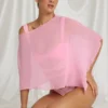 Poncho transparente Zarayah en rosa algodón de azúcar