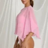 Poncho transparente Zarayah en rosa algodón de azúcar
