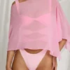 Poncho transparente Zarayah en rosa algodón de azúcar