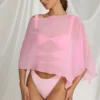 Poncho transparente Zarayah en rosa algodón de azúcar