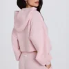 Sudadera con capucha corta de punto suave con cremallera en rosa suave