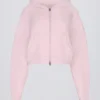 Sudadera con capucha corta de punto suave con cremallera en rosa suave