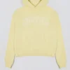 Sudadera con capucha oversize bordada en amarillo suave