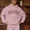Sudadera con capucha oversize bordada en rosa empolvado
