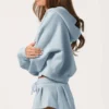 Sudadera con capucha oversize con cremallera en azul claro