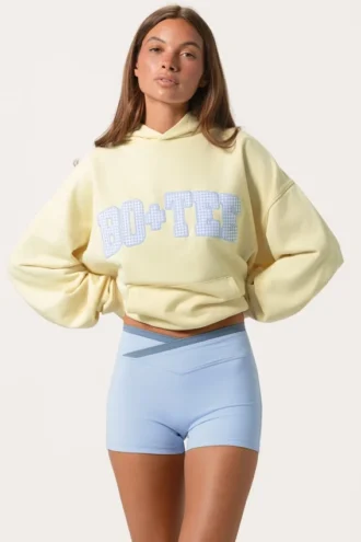 Sudadera con capucha oversize y apliques en color limón
