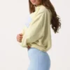 Sudadera con capucha oversize y apliques en color limón