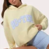 Sudadera con capucha oversize y apliques en color limón