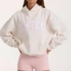 Sudadera con capucha oversize y apliques en color marfil con lunares