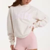 Sudadera con capucha oversize y apliques en color marfil con lunares