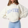 Sudadera con capucha oversize y apliques en color Milk con lunares