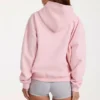 Sudadera con capucha oversize y apliques en color rosa palo