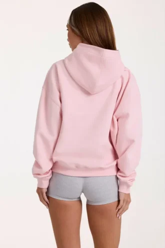 Sudadera con capucha oversize y apliques en color rosa palo
