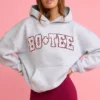 Sudadera con capucha oversize y apliques en gris