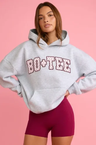 Sudadera con capucha oversize y apliques en gris