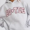 Sudadera con capucha oversize y apliques en gris