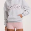 Sudadera con capucha oversize y apliques en gris jaspeado