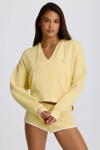 Sudadera con capucha y cuello en V de jersey de algodón en color limón