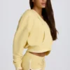 Sudadera con capucha y cuello en V de jersey de algodón en color limón