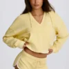 Sudadera con capucha y cuello en V de jersey de algodón en color limón
