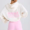Sudadera con capucha y estampado gráfico de jersey de algodón texturizado en blanco