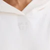 Sudadera con capucha y estampado gráfico de jersey de algodón texturizado en blanco