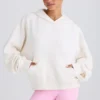 Sudadera con capucha y estampado gráfico de jersey de algodón texturizado en blanco