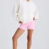Sudadera con capucha y estampado gráfico de jersey de algodón texturizado en blanco