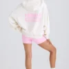 Sudadera con capucha y estampado gráfico de jersey de algodón texturizado en blanco