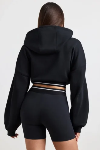 Sudadera corta con capucha de felpa de algodón elástico en negro