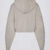 Sudadera corta con capucha y cremallera de punto suave en color beige
