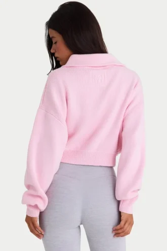 Sudadera corta con cremallera de punto acanalado en rosa pálido
