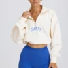 Sudadera corta con cremallera de un cuarto en blanco