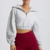 Sudadera corta con cremallera de un cuarto en gris jaspeado