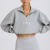 Sudadera corta con cremallera de un cuarto en gris jaspeado