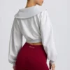 Sudadera corta con cremallera de un cuarto en gris jaspeado