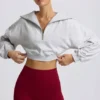 Sudadera corta con cremallera de un cuarto en gris jaspeado