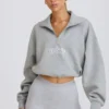 Sudadera corta con cremallera de un cuarto en gris jaspeado