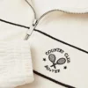 Sudadera corta de rizo con cremallera en color marfil